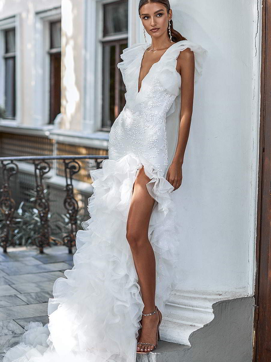 katy-corso-2021-bridal-flutter-sleeveless-plunging-v-neckline-fully-embellished-sheath-mermaid-wedding-dress-ruffle-skirt-chapel-train-20 (1).jpg